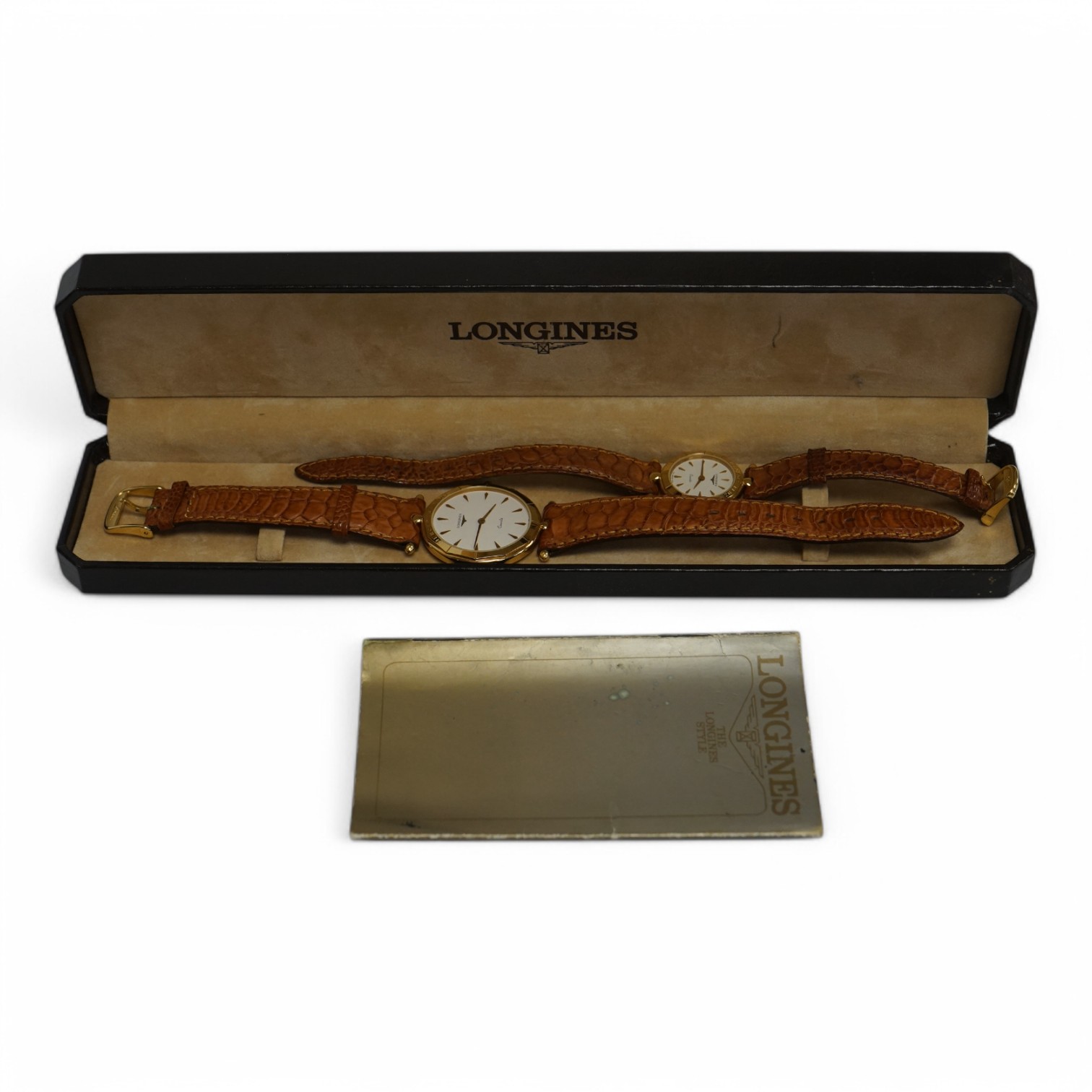 A lady's and gentleman's recent steel and gold plated Longines for Mercedes Benz quartz wrist watches, with baton numerals, on Longines leather straps, case diameters 31mm and 23mm, with single box. Condition - fair to g